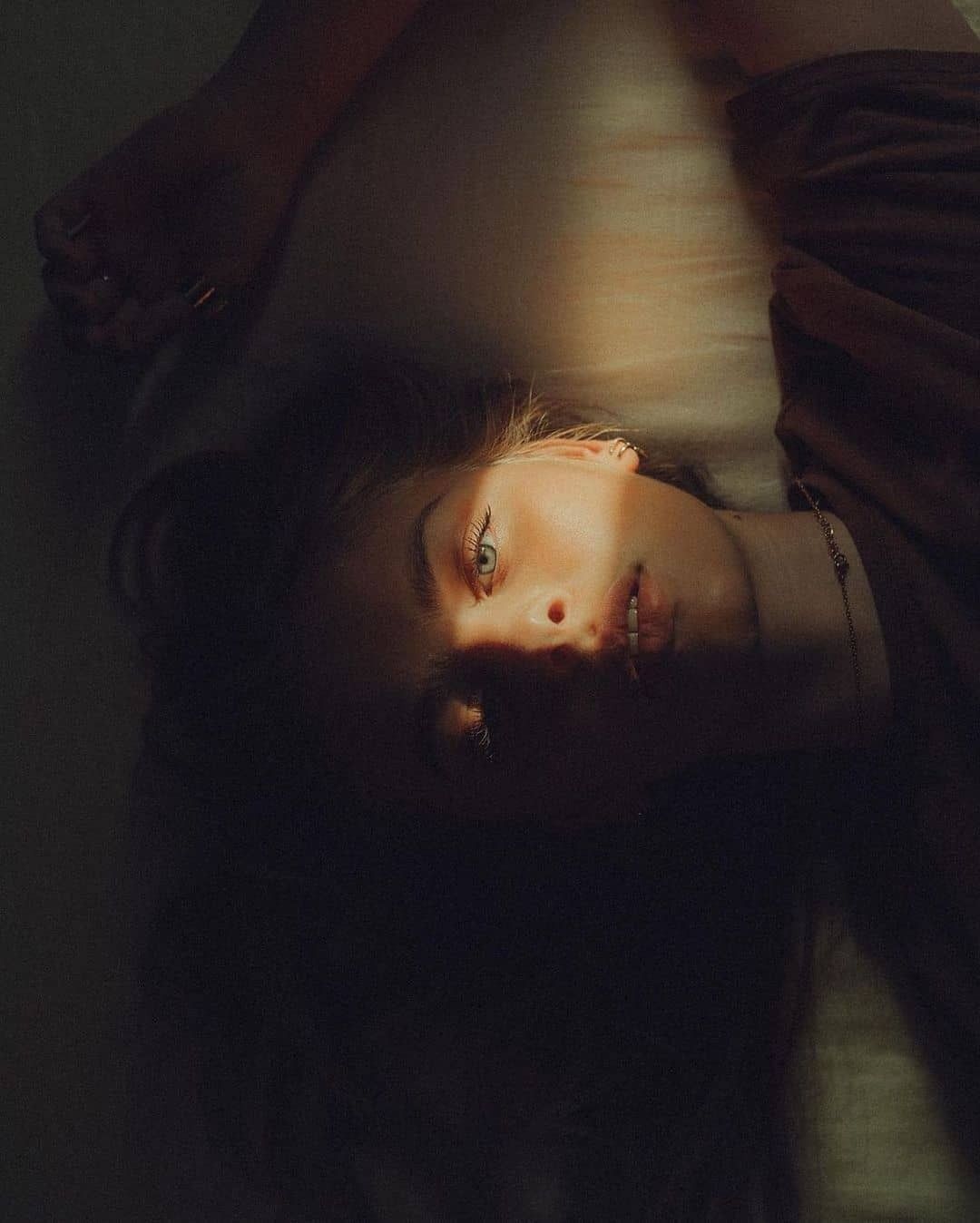 Dramatic fine art photograph exploring light and shadow